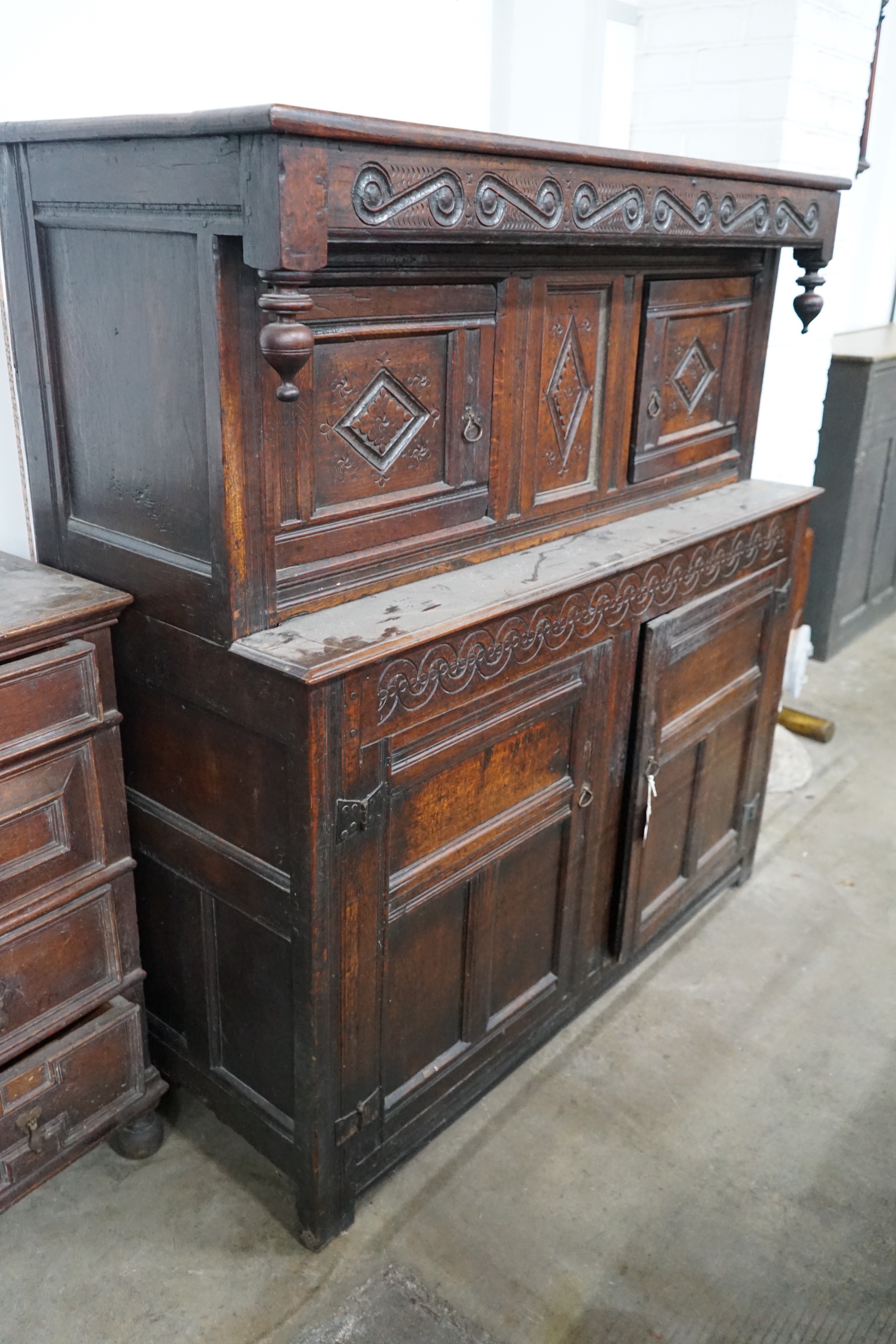 A 17th century oak court cupboard, width 139cm, depth 57cm, height 146cm